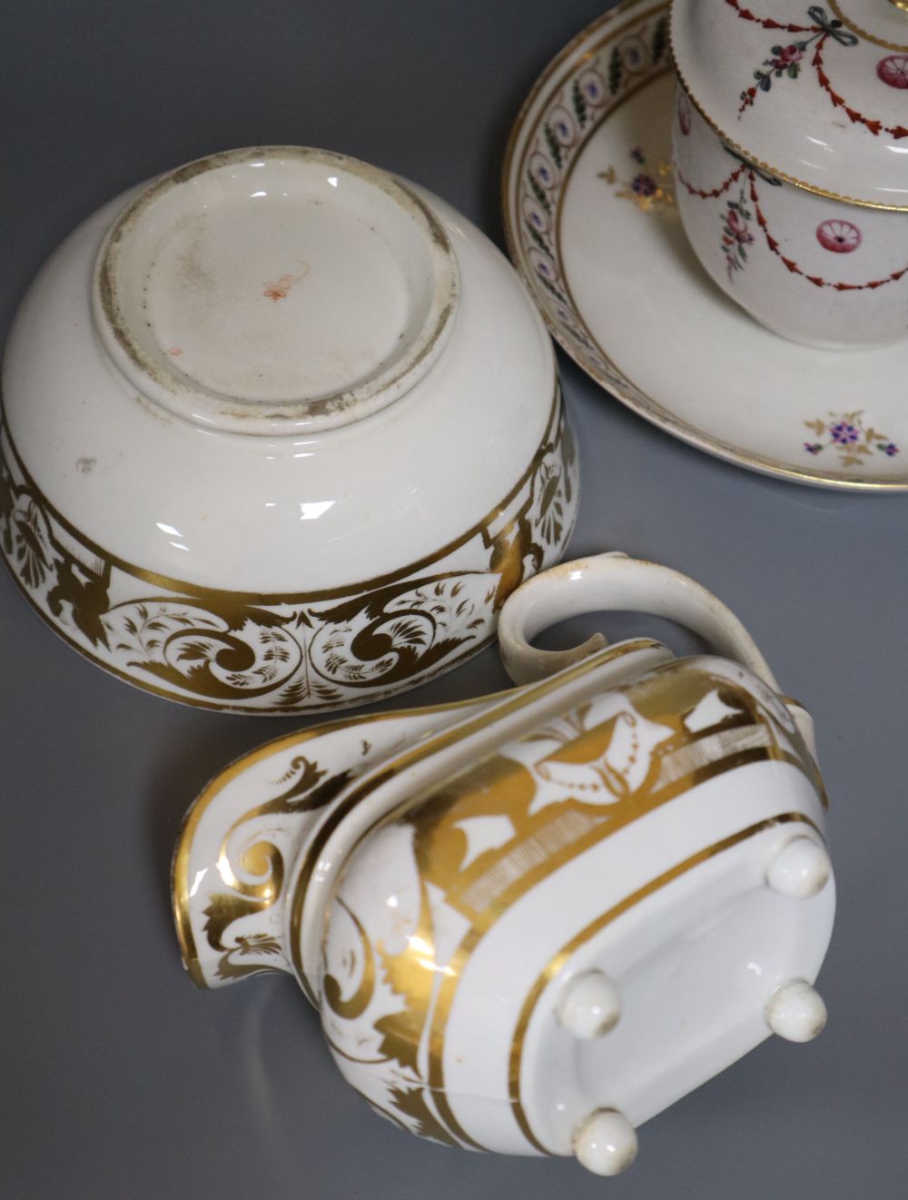 A Derby gilded part tea set, two Derby sucrier and covers and a similar dish, c.1790-1810, blue, puce, gilt and iron red marks